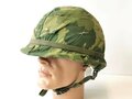 U.S. Vietnam war steel helmet. Mitchell cover dated 68