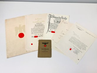 Großformatige Ernennungsurkunde zum Oberintendanturrat, ausgestellt 1940. Dazu drei weitere Ernennungen, eine davon mit eigenhändiger Unterschrift Reichskriegsminister Werner von Blomberg