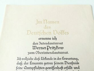 Großformatige Ernennungsurkunde zum Oberintendanturrat, ausgestellt 1940. Dazu drei weitere Ernennungen, eine davon mit eigenhändiger Unterschrift Reichskriegsminister Werner von Blomberg