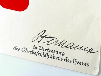 Großformatige Ernennungsurkunde zum Oberintendanturrat, ausgestellt 1940. Dazu drei weitere Ernennungen, eine davon mit eigenhändiger Unterschrift Reichskriegsminister Werner von Blomberg