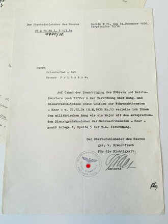 Großformatige Ernennungsurkunde zum Oberintendanturrat, ausgestellt 1940. Dazu drei weitere Ernennungen, eine davon mit eigenhändiger Unterschrift Reichskriegsminister Werner von Blomberg