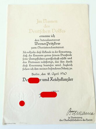 Großformatige Ernennungsurkunde zum Oberintendanturrat, ausgestellt 1940. Dazu drei weitere Ernennungen, eine davon mit eigenhändiger Unterschrift Reichskriegsminister Werner von Blomberg