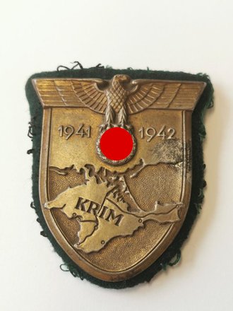 Krimschild 1941/42 auf Heeresstoff, Eisen bronziert, getragenes Stück