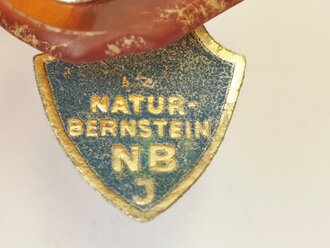 Deutsche Arbeitsfront, Metallabzeichen auf Bernstein