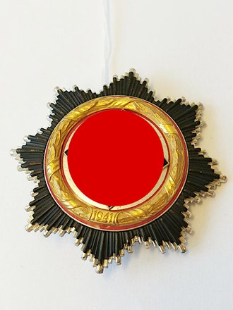 Deutsches Kreuz in gold, Hersteller "134"...