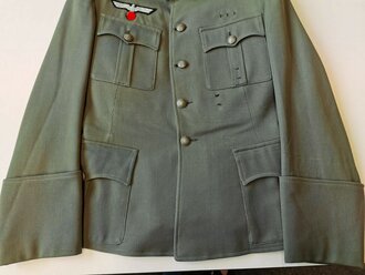 Heer, Feldbluse für einen Offizier im Kavallerie Regiment 9. Eigentumstück, die Effekten jeweils von Hand original vernäht. Defekt am Kragen, sonst guter Zustand