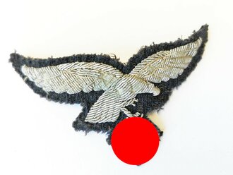 Luftwaffe, Brustadler für Offiziere von der Uniform abgetrennt