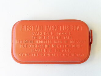 U.S. Army WWII, first aid packet, carlisle bandage, first model ( red