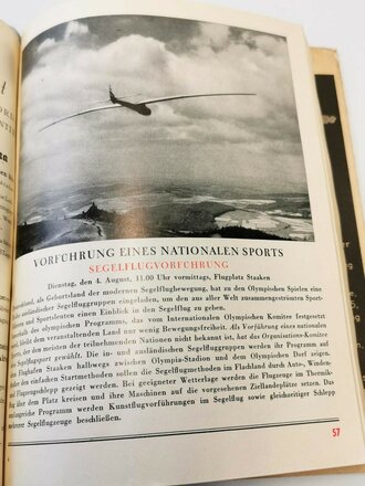 Amtlicher Führer zur Feier der XI. Olympischen Spiele Berlin 1936 mit 172 Seiten und Lesebändchen mit Anhänger Olympiaglocke und Plakette Bochumer Verein