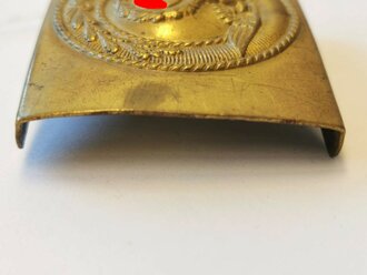 Koppelschloss SA Messing durchgeprägt, getragenes Stück mit Sonnenrad