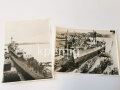 2 Aufnahmen des leichten Kreuzers Köln, einmal beim Stapellauf, einmal im Hafen, mittig geknickt, Maße 18 x 24 cm, Nachkriegsabzüge ?