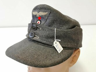 Luftwaffe, Feldmütze Modell 1943. Adler original vernäht, Innenfutter zerschlissen,