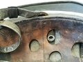 Luftwaffe, Stahlhelm für Angehörige der Fallschirmtruppen Modell 1938.  Spätes Stück mit originaler Tarnlackierung. Innenfutter zum Teil oberflächlich rissig aber weich. Zusammengehöriger, getragener Helm.