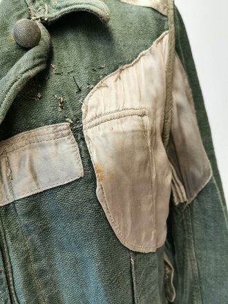 Drillich Feldbluse Wehrmacht. Stark getragenes Stück, die Effekten neuzeitlich unschön ergänzt