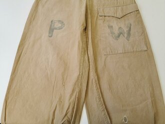 Luftwaffe, Tropenfeldbluse und Beintaschenhose eines in amerikanische Kriegsgefangenschaft geratenen Soldaten PW = Prisoner of war.