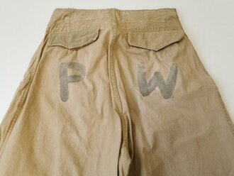 Luftwaffe, Tropenfeldbluse und Beintaschenhose eines in amerikanische Kriegsgefangenschaft geratenen Soldaten PW = Prisoner of war.