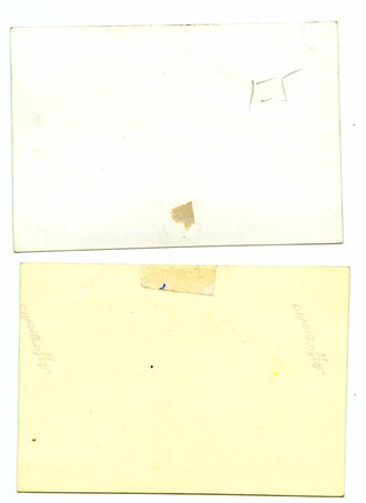 Acht Aufnahmen von Angehörigen des Heeres in Wintertarn bekleidung in ihren Feldstellungen und auf dem Marsch, maße 7 x 10cm