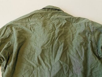 U.S. 1960´s dated Utility Shirt 1st Pattern. Insignia original sewn. This is the type shirt the used early in the Vietnam war