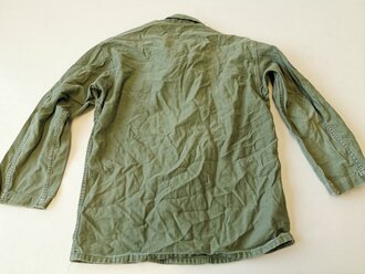 U.S. 1960´s dated Utility Shirt 1st Pattern. Insignia original sewn. This is the type shirt the used early in the Vietnam war