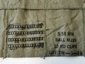 U.S. 196? dated 5,56mm Ammunition Bandolier with filler tool. Unissued set