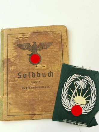 Heer, Soldbuch und Ärmelabzeichen Sonderverband 287 . Ungetragenes Bevo Abzeichen, beim Soldbuch fehlen die ersten 4 Seiten, auf Seite 22a eingetragen " "Berechtigt zum tragen Ärmelabzeichen mit Palme" vom 14.9.42