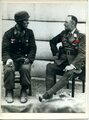 Aufnahme, eines Leutnant der Fallschirmtruppe im Gespräch mit General Student, Rückseitig der Stempel eines Berliner Photostudio, Maße 18 X 24cm