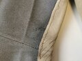 Stabsveterinär Dr.Helm, steingraue Stiefelhose datiert 1934 mit dazugehörigem Viertaschenrock. Dieser mit original vernähten Effekten. Stärker getragenes, zusammengehöriges Set