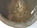 U.S. M1 steel helmet. Front seam WWII shell with later liner, uncleaned set