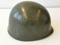 U.S. M1 steel helmet. Front seam WWII shell with later liner, uncleaned set