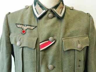 Heer, Feldbluse Modell 1936 für einen Unteroffizier. Getragenes Stück, die Effekten original vernäht, Kammerstück in sehr gutem Zustand