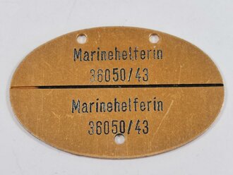 Erkennungsmarke für eine Marinehelferin