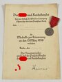 Medaille zur Erinnerung an den 13.März 1938 mit Verleihungsurkunde für einen Feldwebel im Kradschützen Bataillon 2