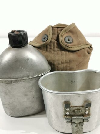 U.S. WWII canteen. Cover dated 1942, bottle and cup dated...