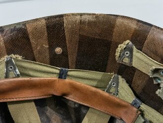 U.S. WWII helmet liner, repainted, nape strag and sweat band replaced for use after WWII