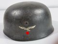 Fallschirmjäger Stahlhelm Modell 1938. In allen Teilen originales und zusammengehöriges Stück, das Hakenkreuz zu 95% erhalten.  Kinnriemen leicht gekürzt, sonst guter Zustand