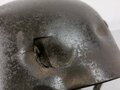 Luftwaffe, Stahlhelm für Angehörige der Fallschirmtruppen Modell 1938. Spätes Stück mit Splitterschaden, in allen Teilen Original