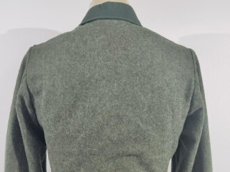 Heer, Feldbluse Modell 1936 für Mannschaften. Leicht getragenes Kammerstück, in der Zeit unten gekürzt, der Adler neuzeitlich vernäht