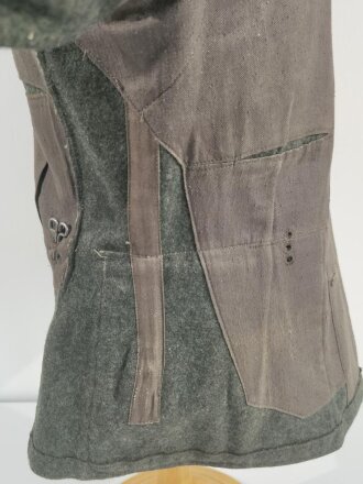 Heer, Feldbluse Modell 1936 für Mannschaften. Leicht getragenes Kammerstück, in der Zeit unten gekürzt, der Adler neuzeitlich vernäht