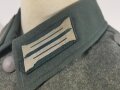 Heer, Feldbluse Modell 1936 für Mannschaften. Leicht getragenes Kammerstück, in der Zeit unten gekürzt, der Adler neuzeitlich vernäht