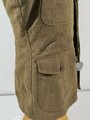 U.S. WWI Tunic Model 1912. Collar disk " Artillery" The soldier was part of the 1st Army Division , which arrived in Europe in August 1918 and was part of several battles in France. Good condition, insignia original sewn. Comes with a set of dog tags