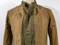 U.S. WWI Tunic Model 1912. Collar disk " Artillery" The soldier was part of the 1st Army Division , which arrived in Europe in August 1918 and was part of several battles in France. Good condition, insignia original sewn. Comes with a set of dog tags