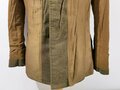 U.S. WWI Tunic Model 1912. Collar disk " Artillery" The soldier was part of the 1st Army Division , which arrived in Europe in August 1918 and was part of several battles in France. Good condition, insignia original sewn. Comes with a set of dog tags