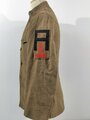 U.S. WWI Tunic Model 1912. Collar disk " Artillery" The soldier was part of the 1st Army Division , which arrived in Europe in August 1918 and was part of several battles in France. Good condition, insignia original sewn. Comes with a set of dog tags