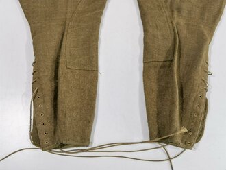 U.S. WWI  Model 1917 trousers, label with 1917 date. Used, some moth holes and repair, Bundweite: 76 cm