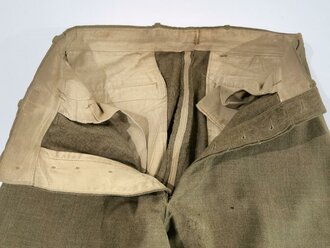 U.S. WWI  Model 1917 trousers, label with 1917 date. Used, some moth holes and repair, Bundweite: 76 cm