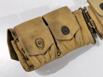 U.S. WWI Model 1914 cartridge belt with nine pouches and one M1911.45 magazine pouch. Used