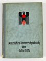 Amtliches Unterrichtsbuch über Erste Hilfe , komplett, Einband leicht beschädigt