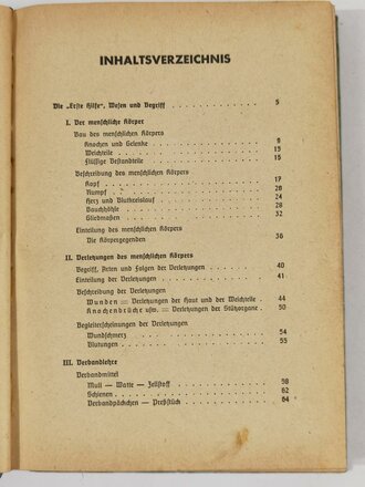 Amtliches Unterrichtsbuch über Erste Hilfe , komplett, Einband verschmutzt