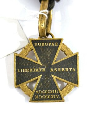Österreich Befreiungskriege Armeekreuz 1813/1814 ,sog. "Kanonenkreuz". Bronze geschwärzt, an altem Dreiecksband