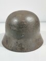 Heer, Stahlhelm Modell 1935. In allen Teilen Originales, zusammengehöriges  Stück. Das Hakenkreuz des Adlers zu 95% erhalten, ET60